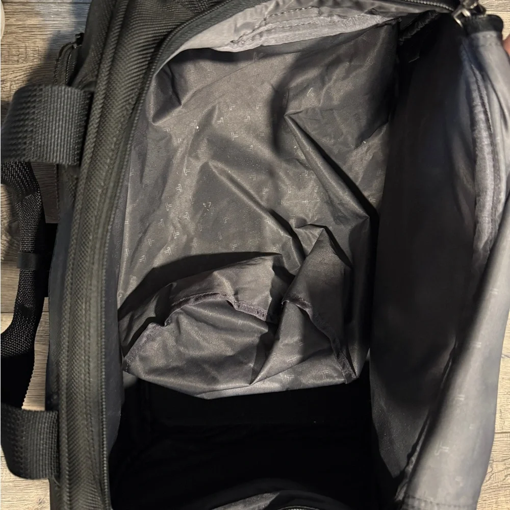 Tumi Black Duffel Bag with Durable Design